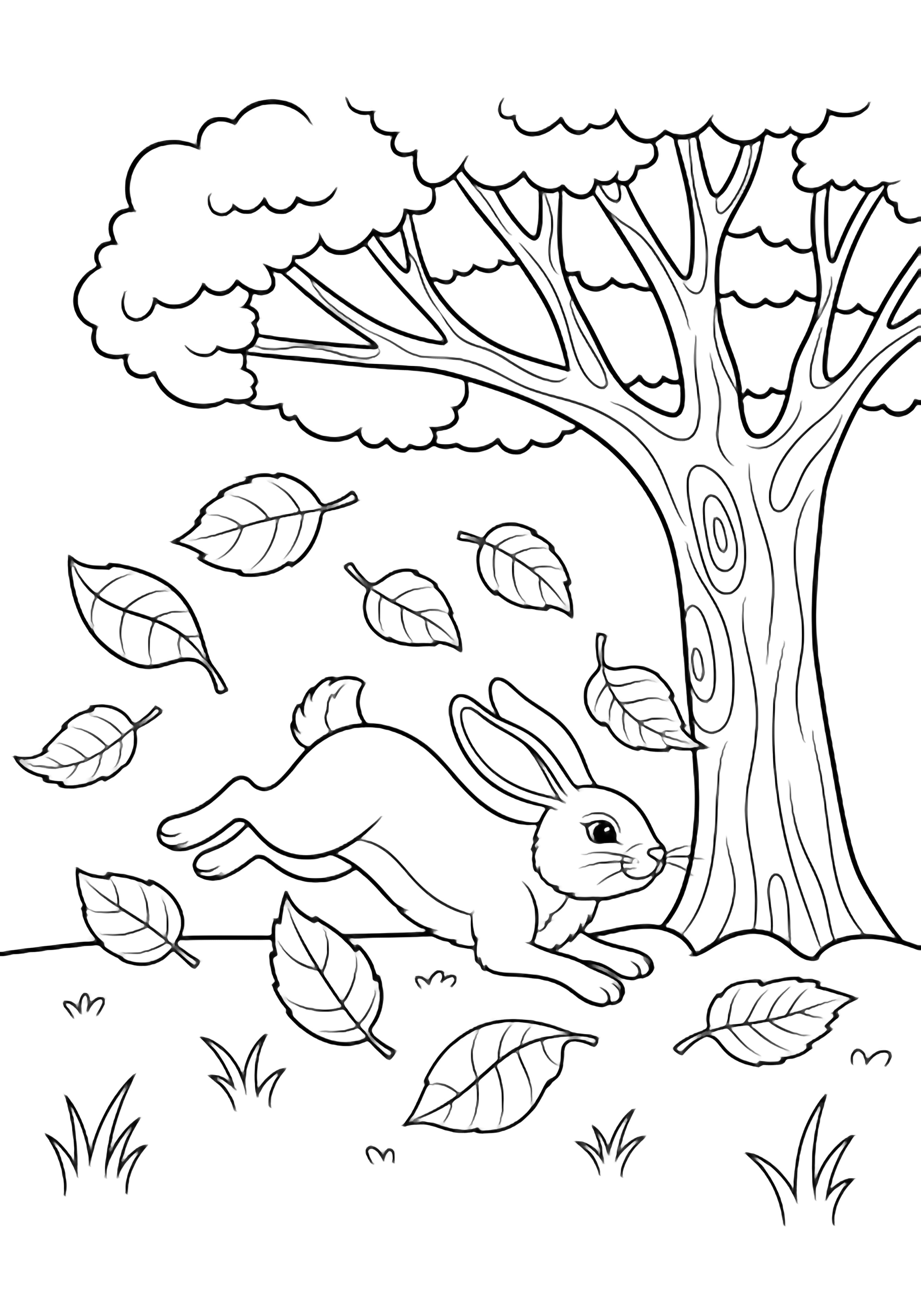 A joyful rabbit leaps between large fallen leaves beneath a broad, open-trunked tree with tufts of grass around. kleurplaat